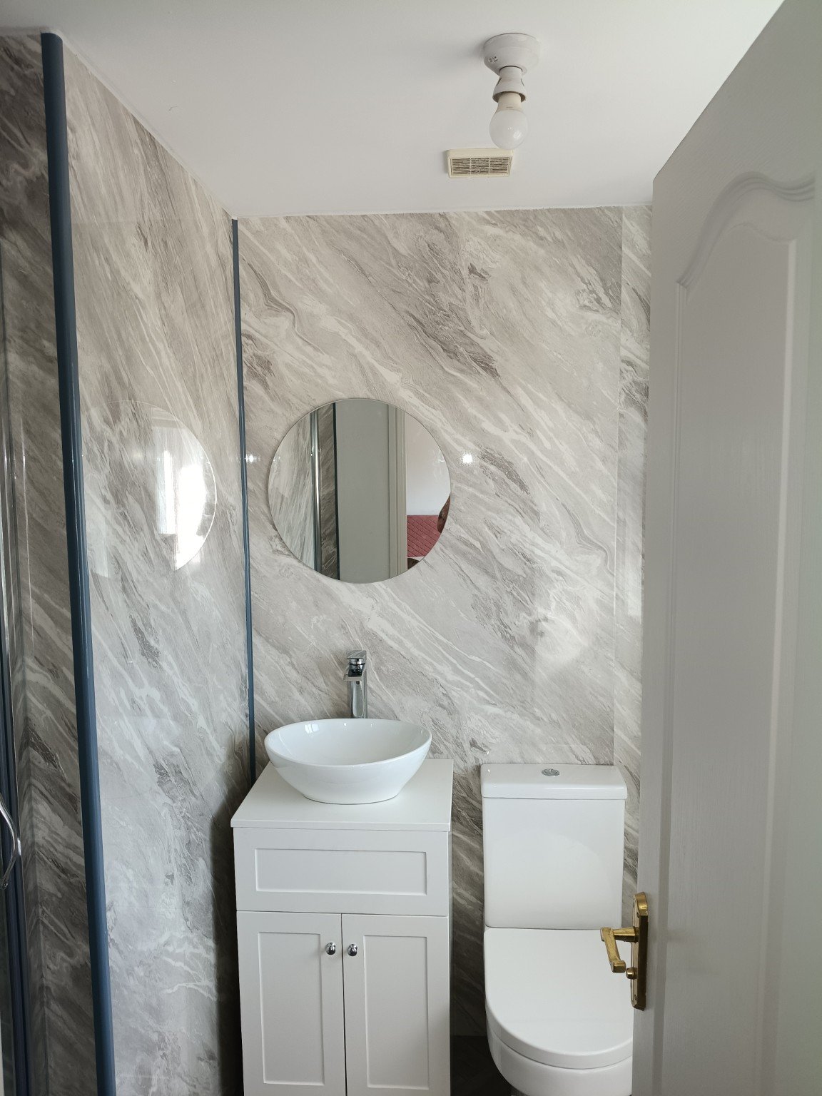 Bathroom renovation with vanity and toilet
